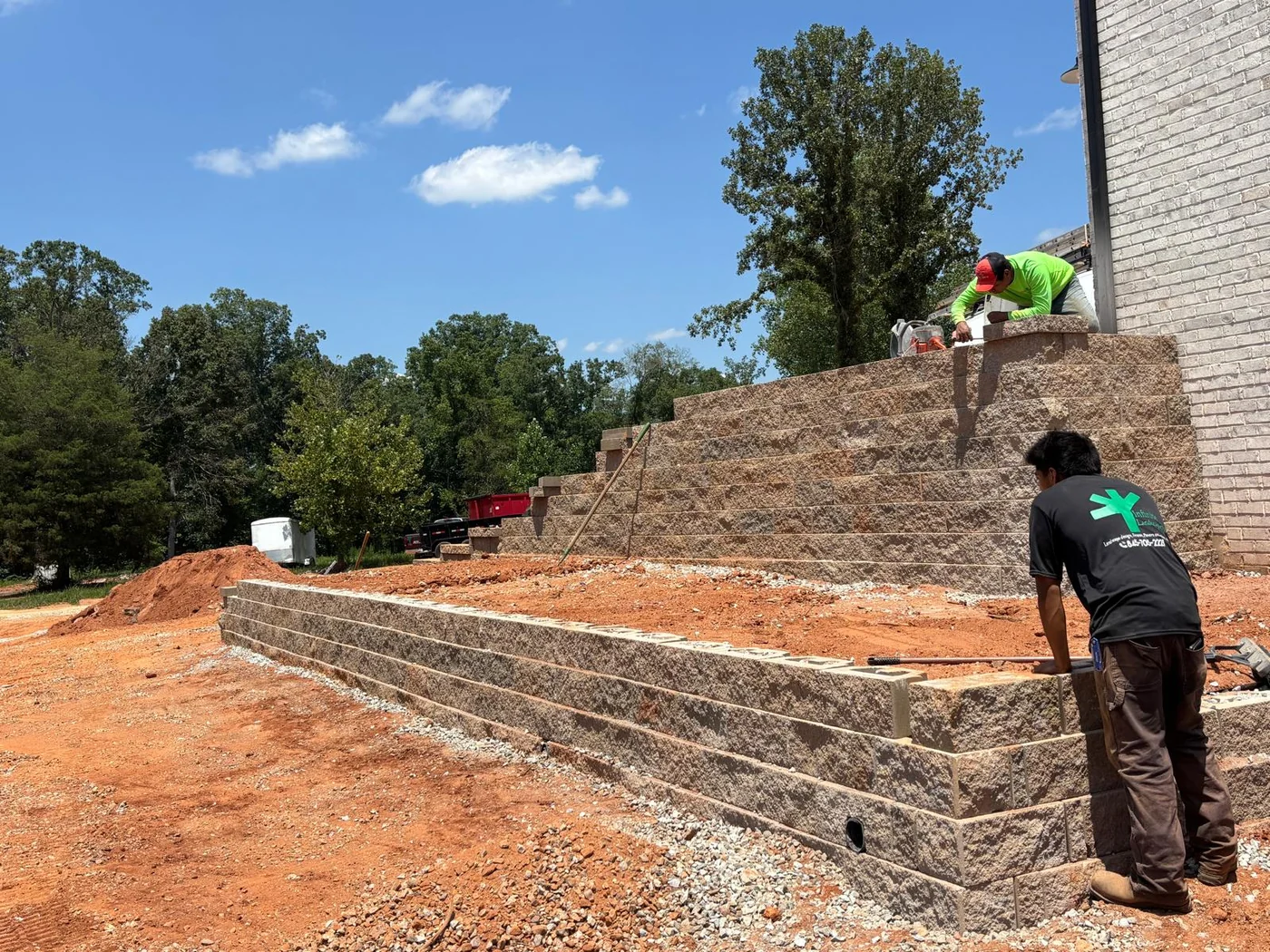 Infinite Outdoor Construction tiered retaining wall project photo